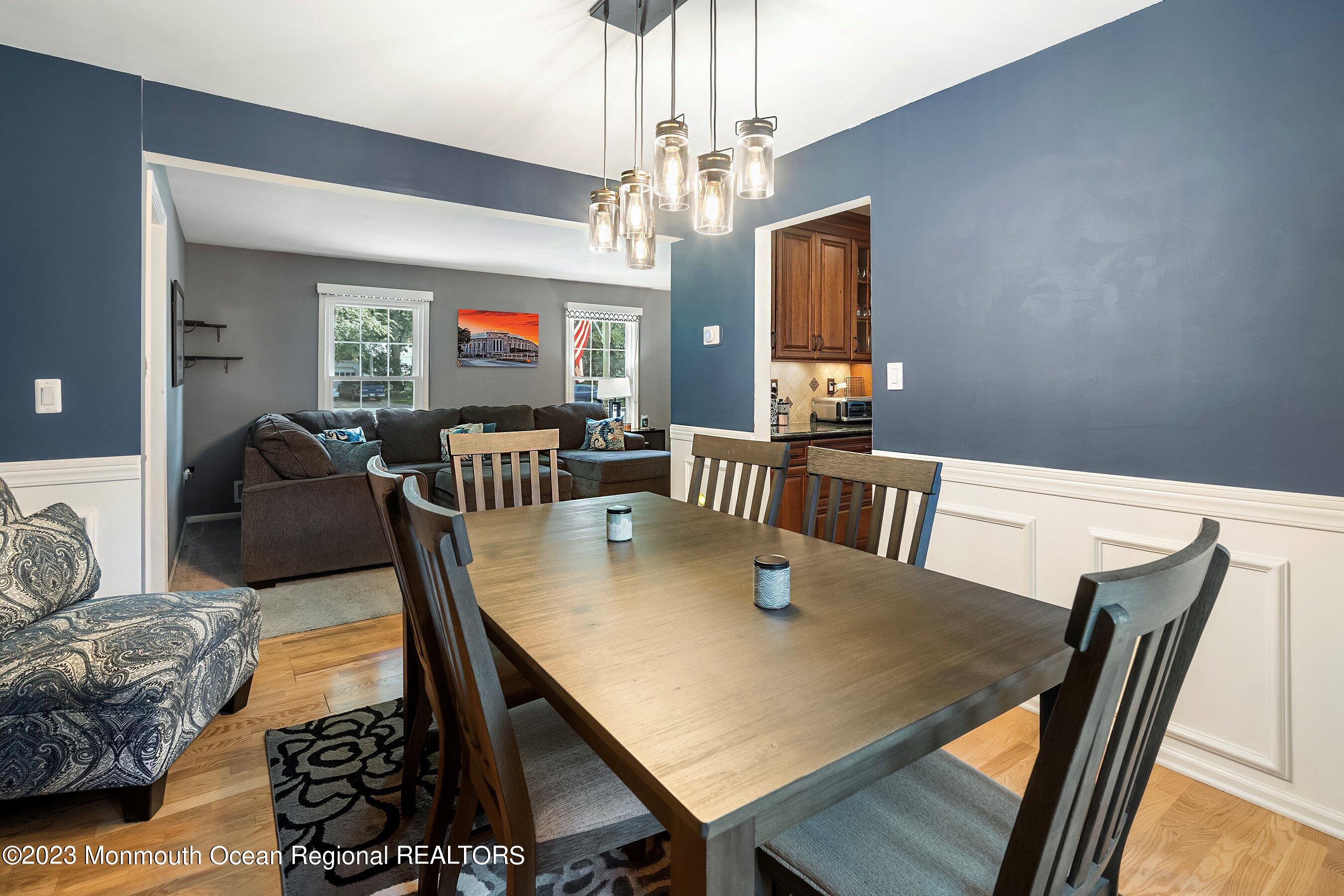 3 Adams Court Howell, NJ 07731 - Photo 16 of 36 a view of a dining room with furniture window and wooden floor