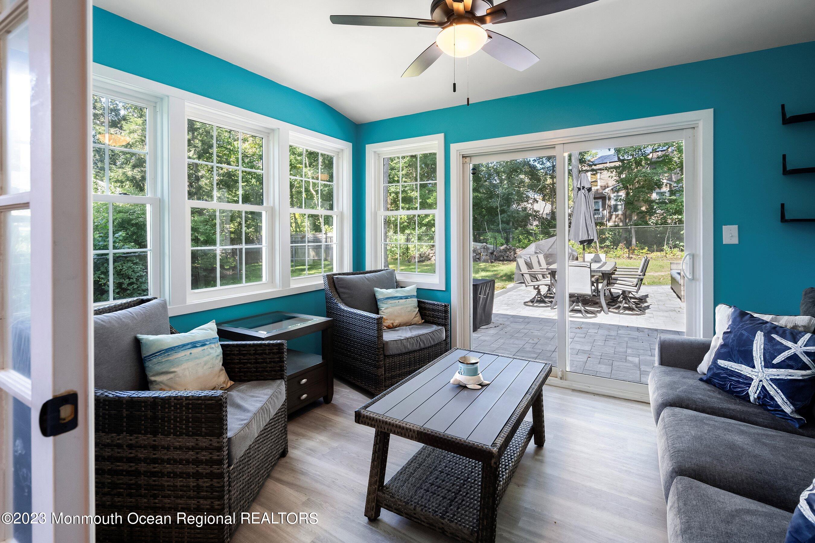 3 Adams Court Howell, NJ 07731 - Photo 30 of 36 a living room with furniture and a large window