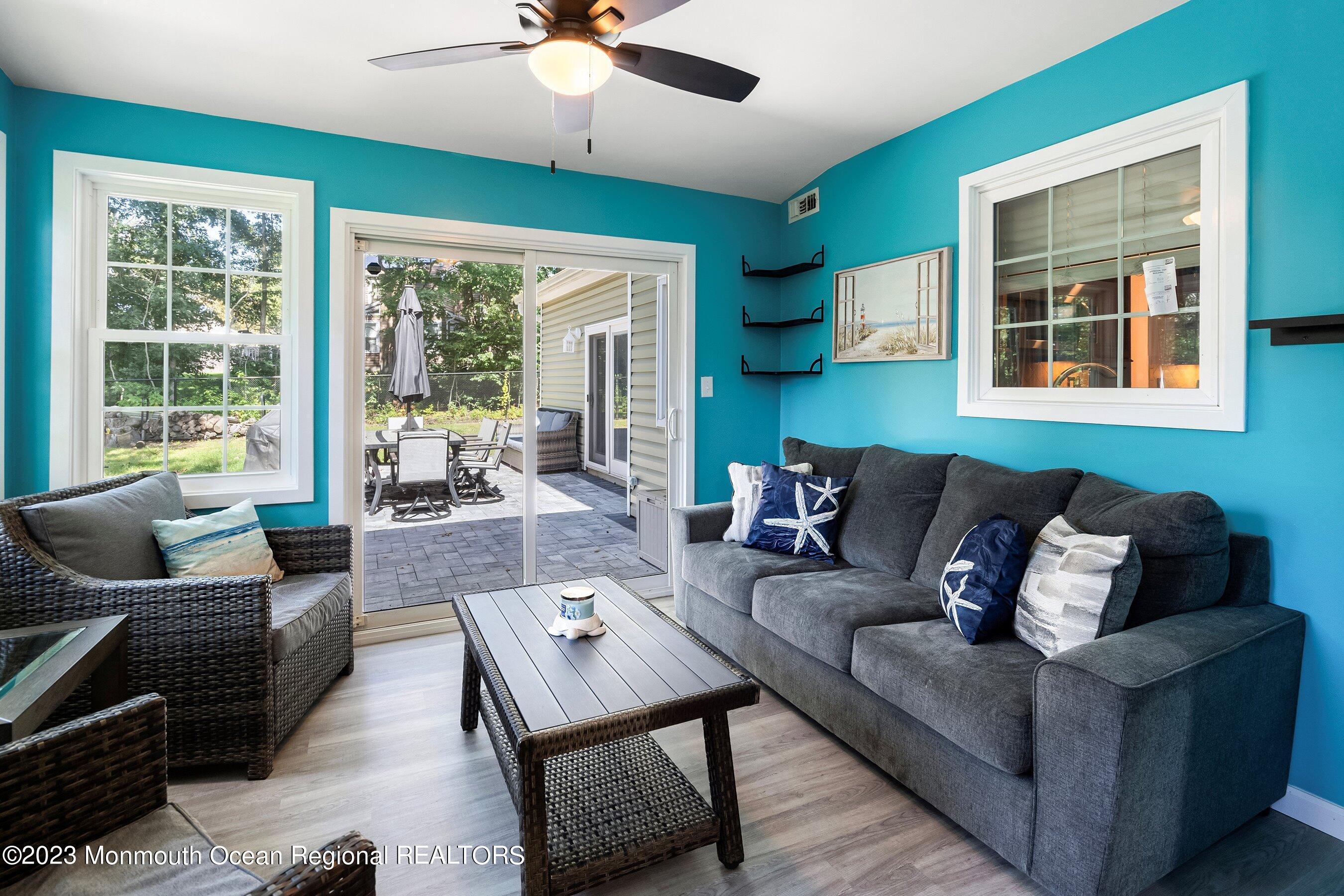 3 Adams Court Howell, NJ 07731 - Photo 32 of 36 a living room with furniture and a large window