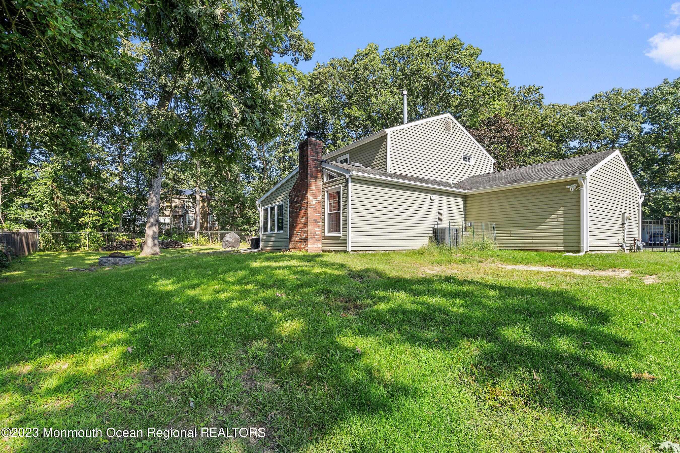 3 Adams Court Howell, NJ 07731 - Photo 36 of 36 a view of a house with backyard