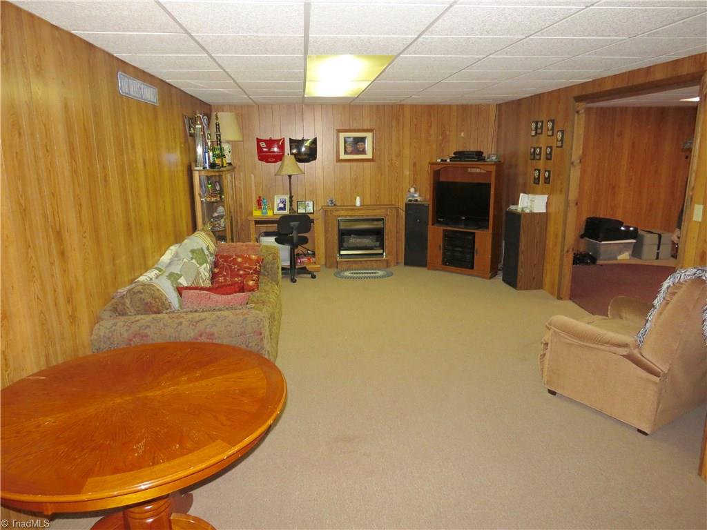 640 Moir Mill Road Eden, NC 27288 - Photo 13 of 19 Additional living room/den area in the basement.
