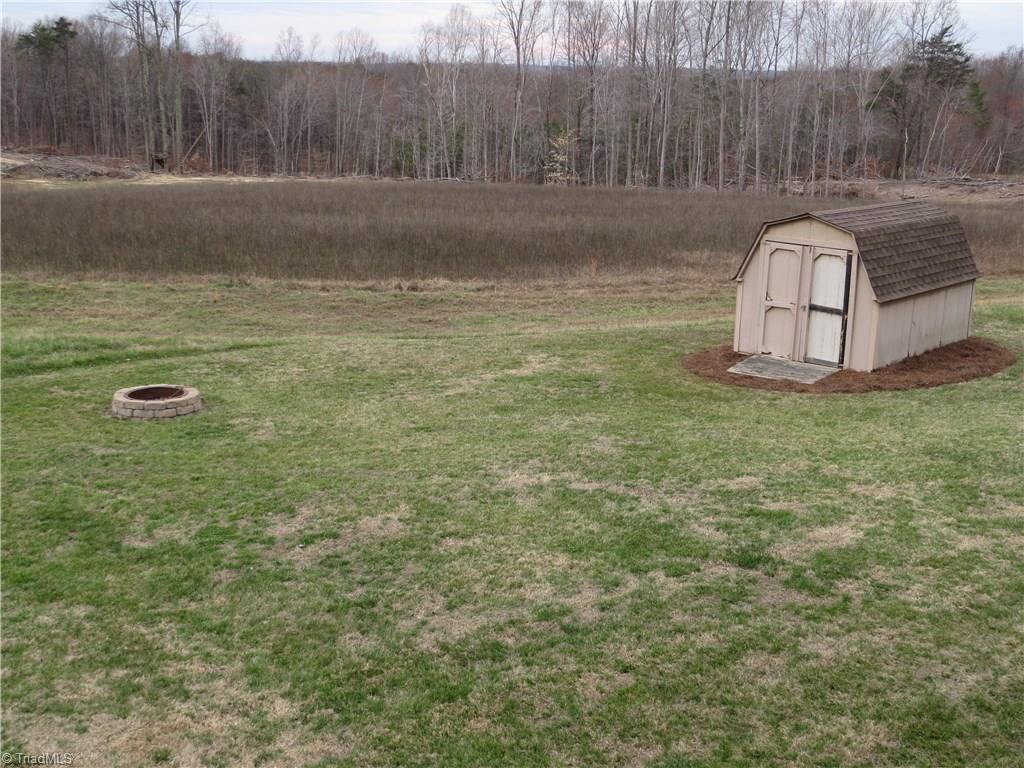 640 Moir Mill Road Eden, NC 27288 - Photo 19 of 19 back yard and storage building.