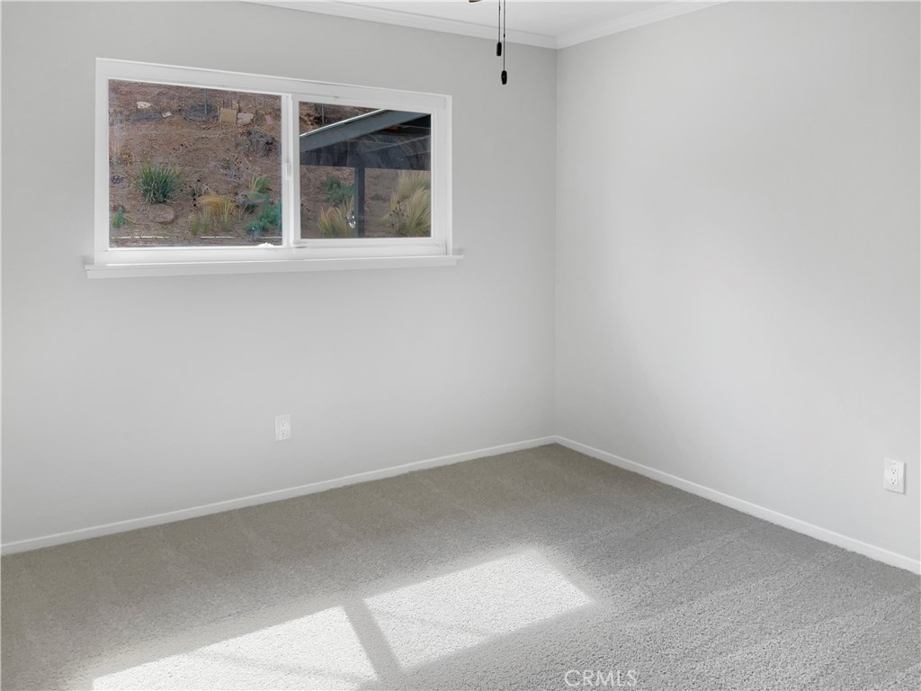 6376 Westview Drive Riverside, CA 92506 - Photo 13 of 23 an empty room with a window