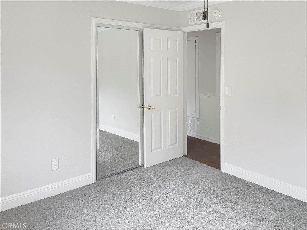 6376 Westview Drive Riverside, CA 92506 - Photo 16 of 23 an empty room with closet area