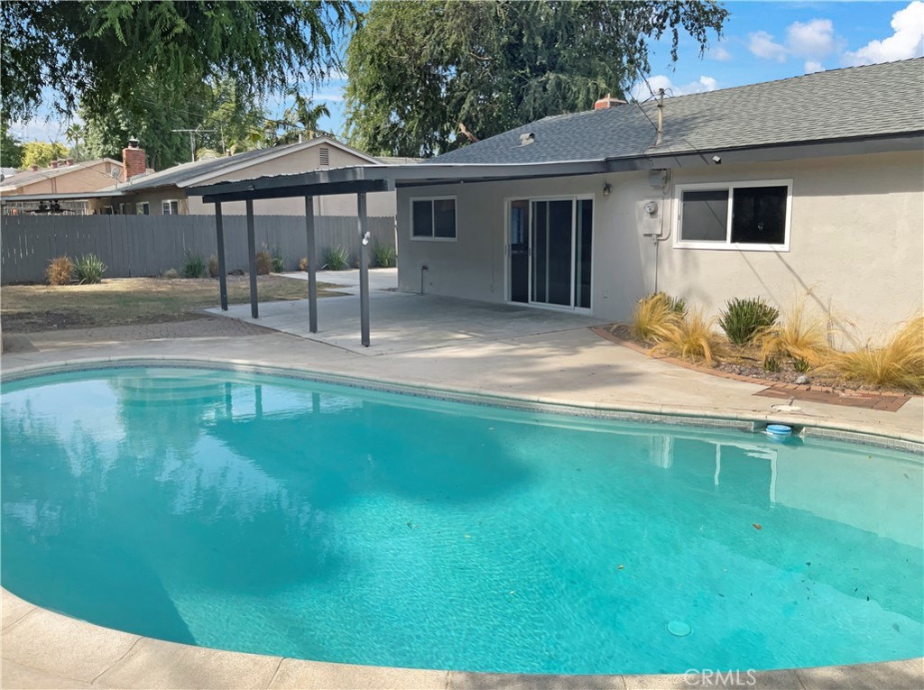 6376 Westview Drive Riverside, CA 92506 - Photo 21 of 23 a backyard of a house with table and chairs