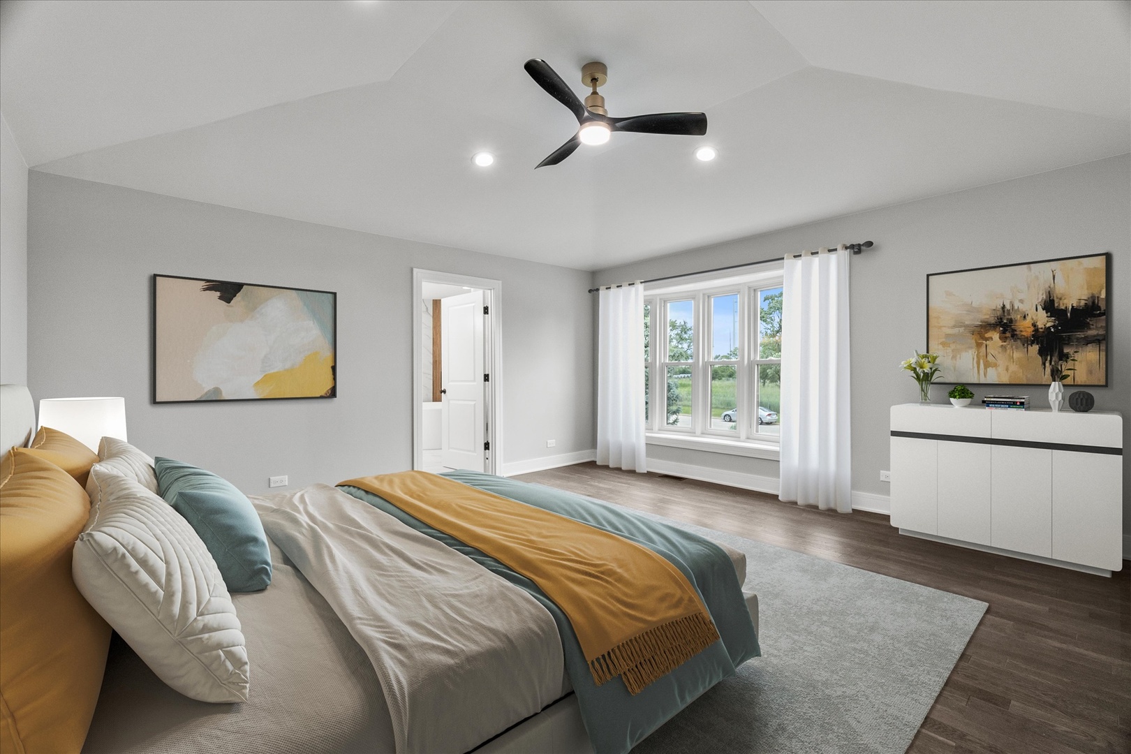 S424 Cadwell Avenue Elmhurst, IL 60126 - Photo 12 of 29 a bedroom with a large bed and a window