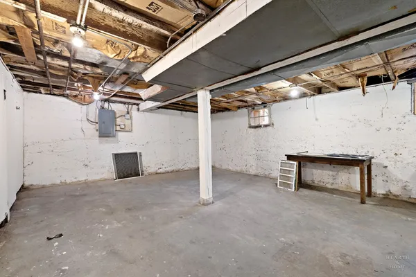 a view of a room with wooden walls