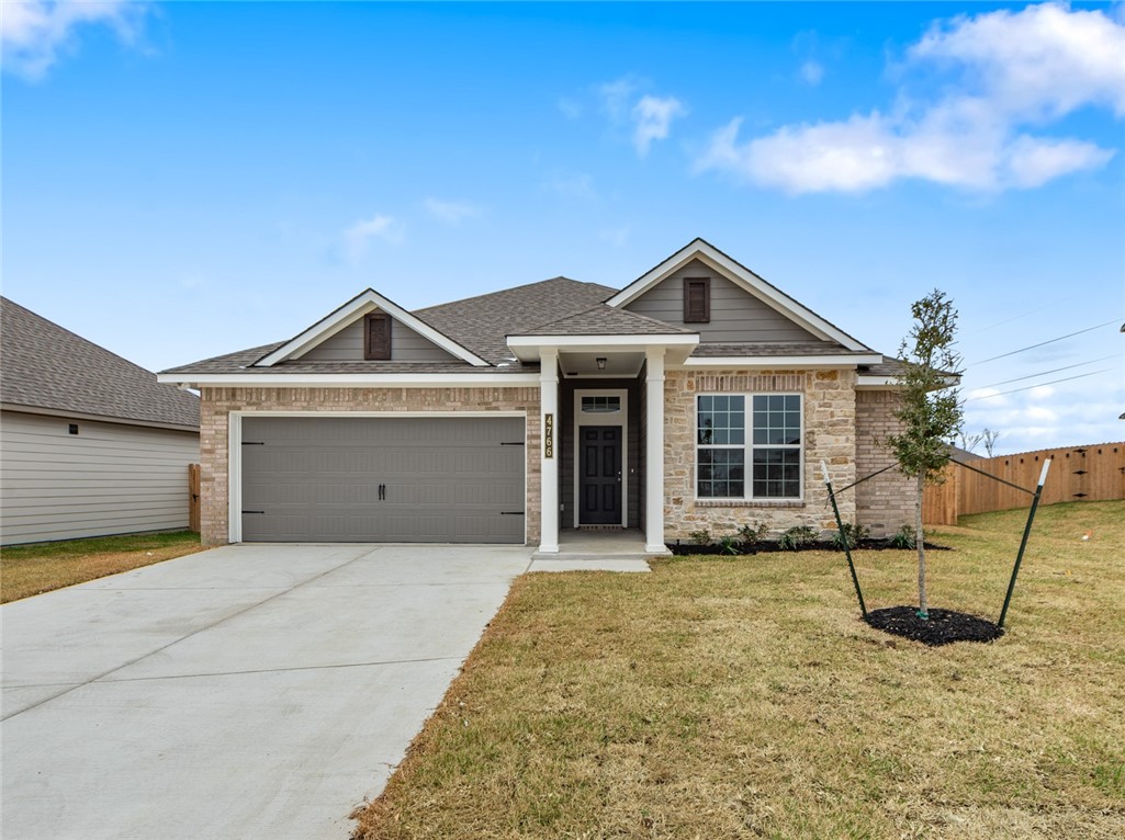 4766 Holm Oak Road Bryan, TX 77845 - Photo 1 of 1 View of front of property with a front lawn and a