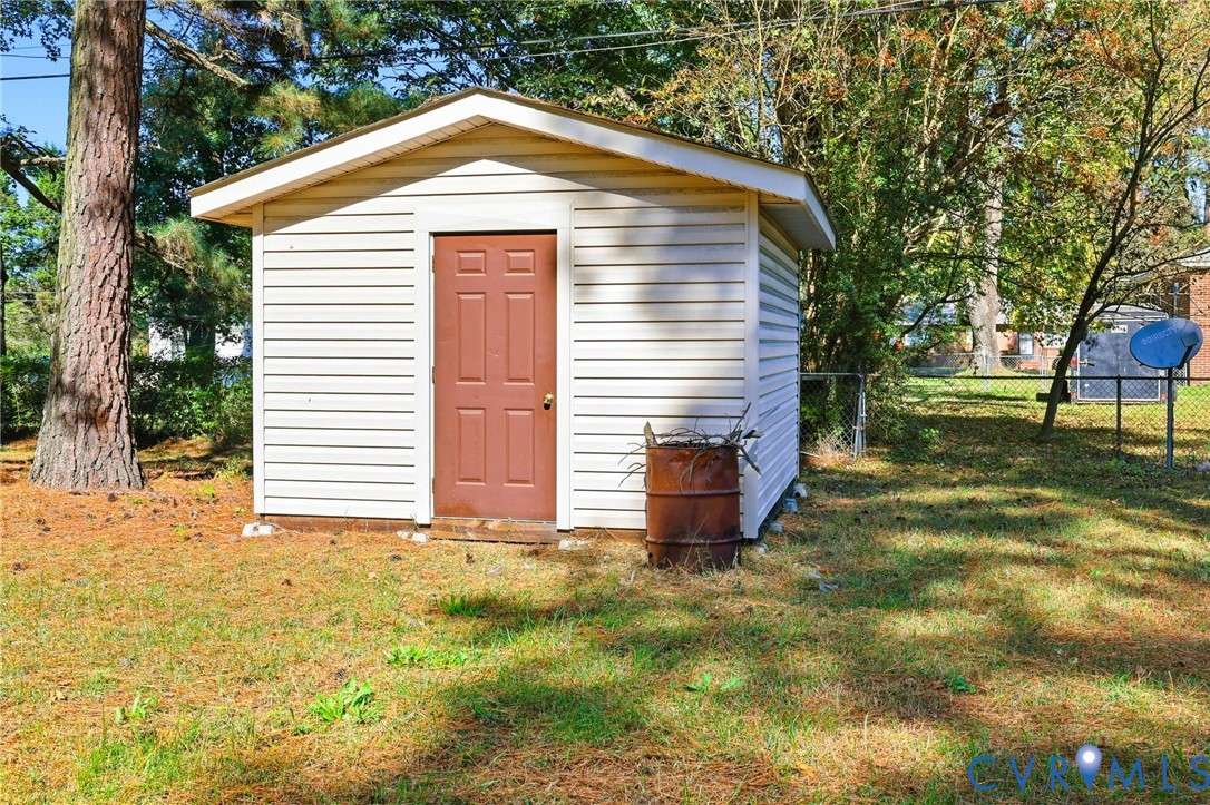 2521 Fort Lee Road Petersburg, VA 23805 - Photo 25 of 27 a view of a house with a yard and large tree