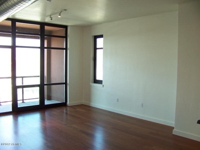 310 South 4th Street, Unit 1304 Phoenix, AZ 85004 - Photo 2 of 15 Living Room with Views that go on Foreve