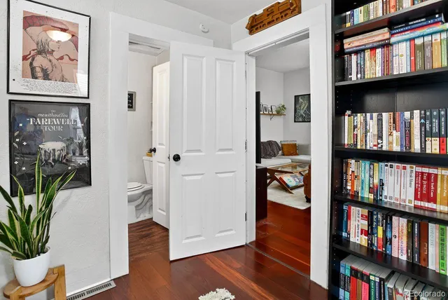 a view of room with furniture and book shelf