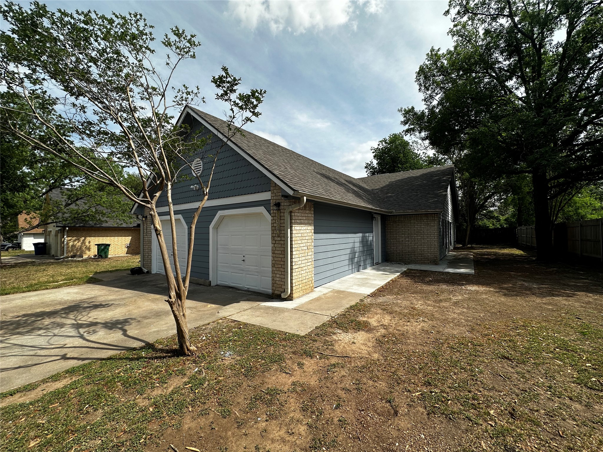a house with trees in the background