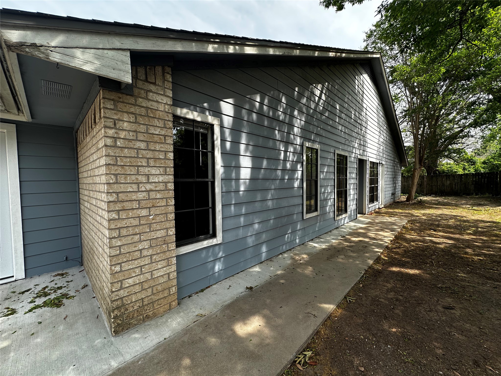 8809 Cainwood Lane Austin, TX 78729 - Photo 8 of 27 a view of a house with a door