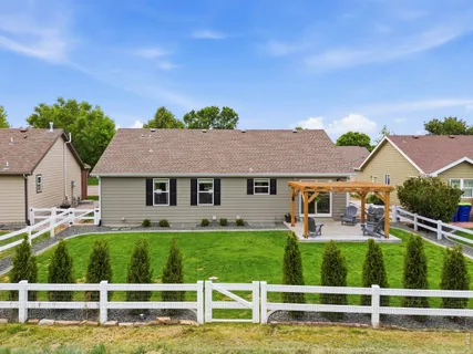 an aerial view of a house with a garden view