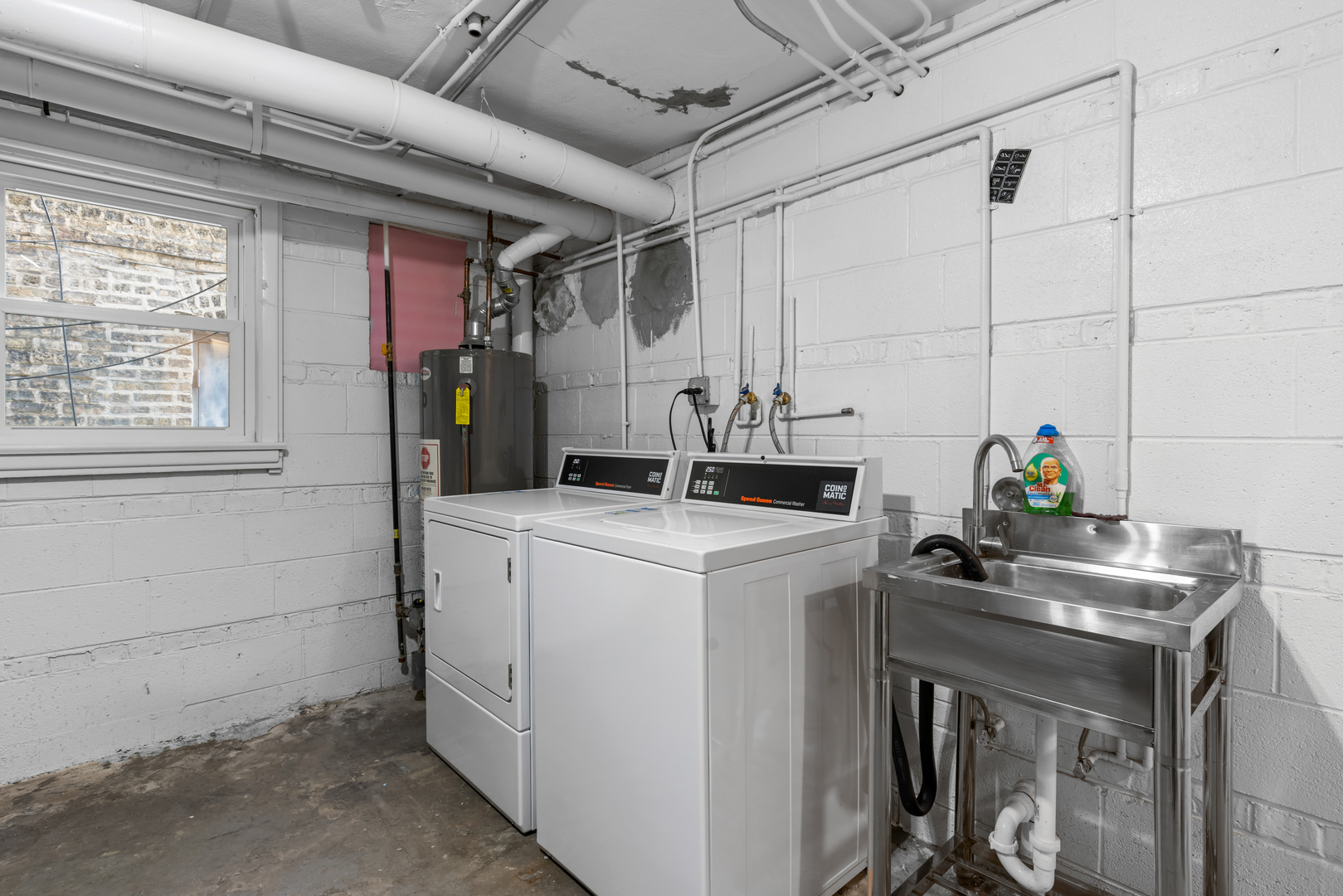 135 Custer Avenue, Unit 3 Evanston, IL 60202 - Photo 17 of 18 a utility room with dryer and washer