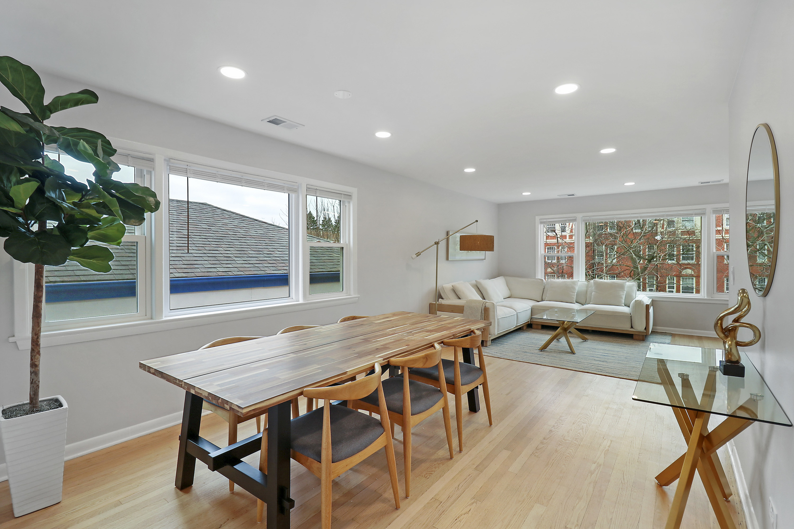 135 Custer Avenue, Unit 3 Evanston, IL 60202 - Photo 8 of 18 a view of a dining room with furniture window and outside view