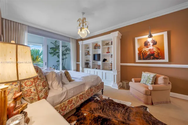 a balcony view with a large window and wooden floor