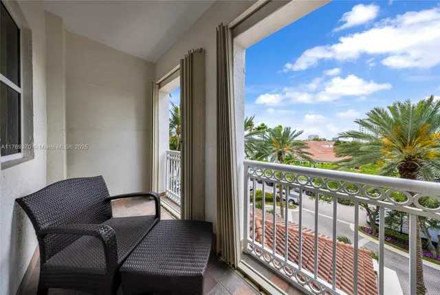 a bathroom with a granite countertop sink a toilet a mirror and shower