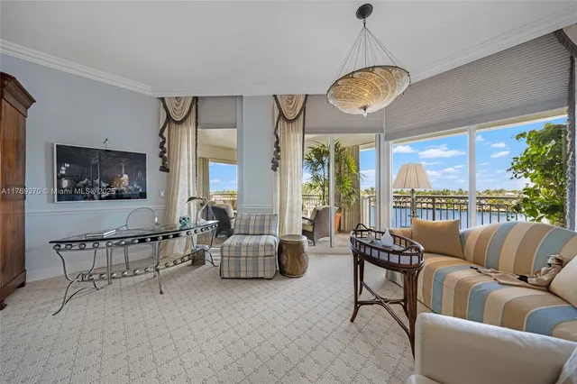 a bathroom with a bath tub a sink and a mirror