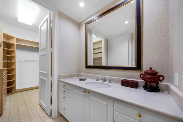 a kitchen with a stove sink and microwave