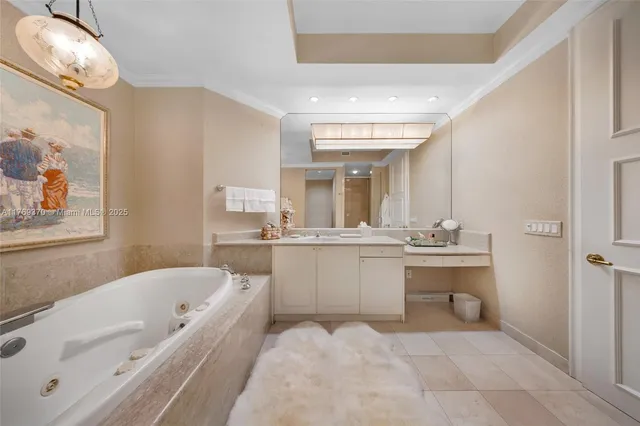 a view of a dining room with furniture a chandelier and wooden floor
