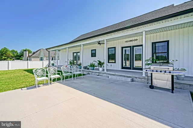 a house view with outdoor seating space