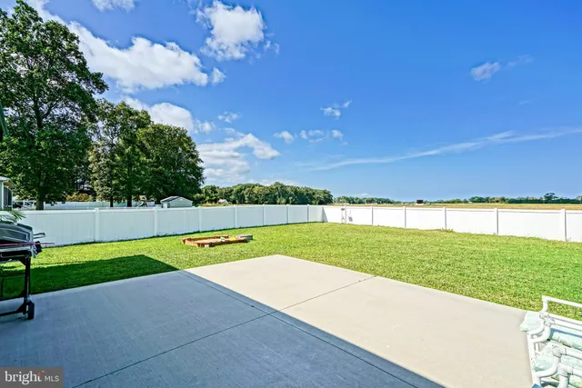 a view of a swimming pool and an outdoor space