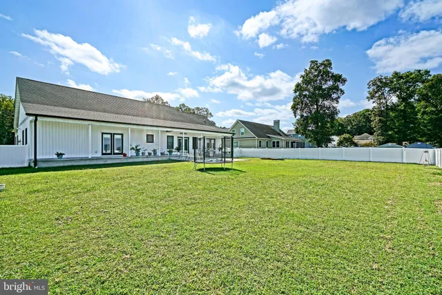 a view of a house with a big yard