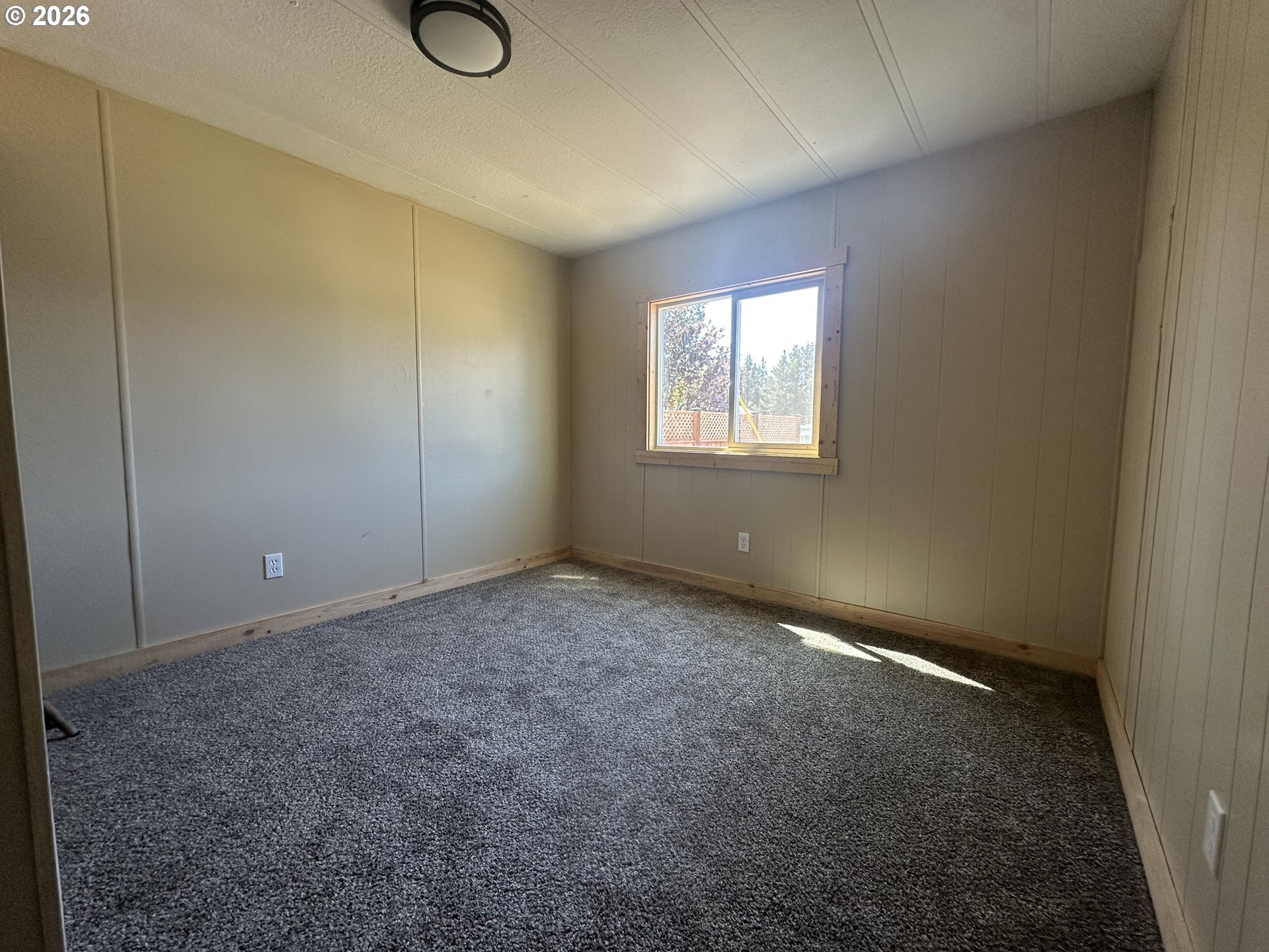 355 North 8th Street Lakeside, OR 97449 - Photo 22 of 22 a view of an empty room and window