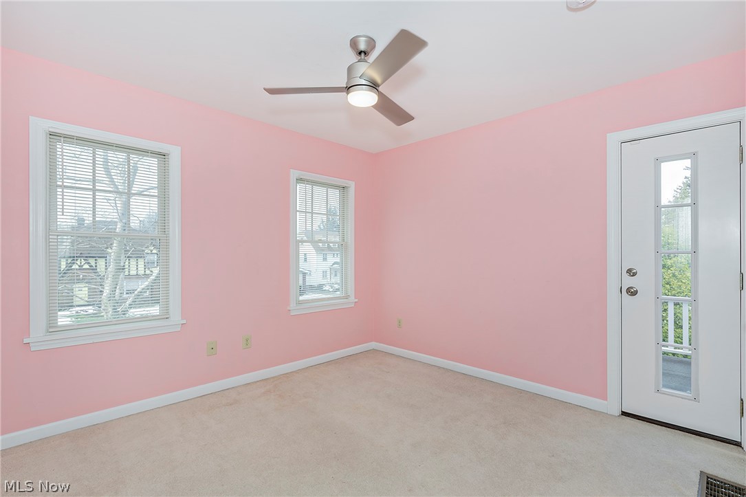 917 Brunswick Road Cleveland Heights, OH 44112 - Photo 26 of 42 Bedroom two with balcony access, closet and ceiling fan.