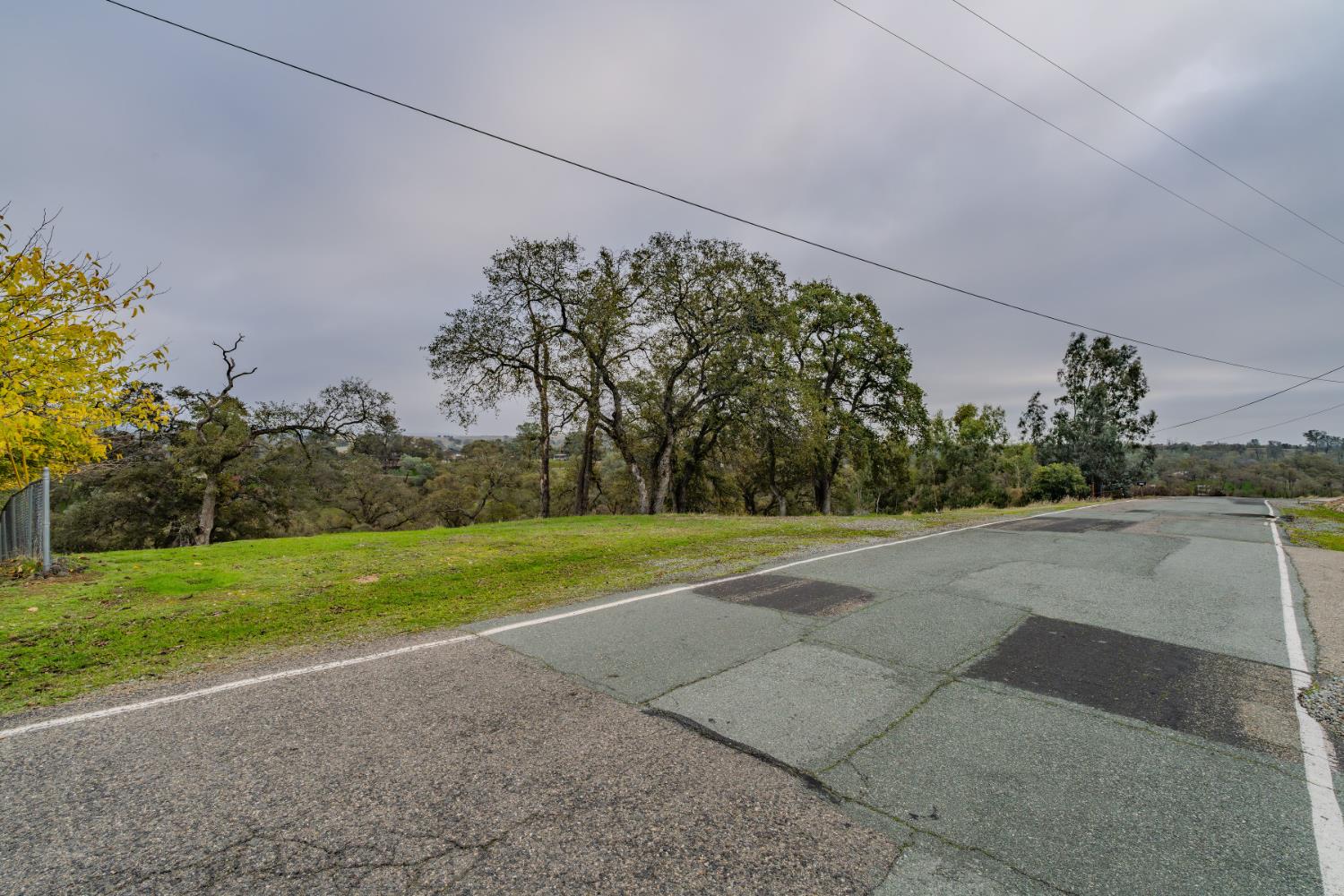 8719 Sparrowk Road Valley Springs, CA 95252 - Photo 17 of 29 a view of a field with trees
