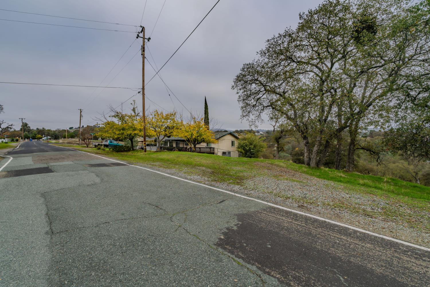 8719 Sparrowk Road Valley Springs, CA 95252 - Photo 18 of 29 a view of a street with a building in the background