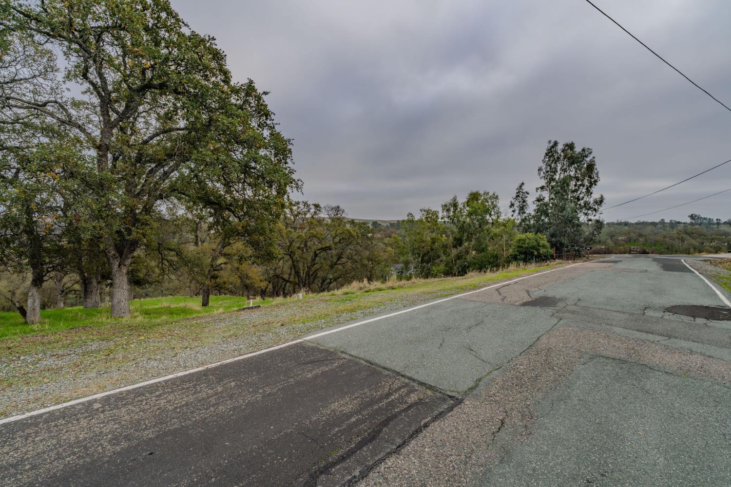 8719 Sparrowk Road Valley Springs, CA 95252 - Photo 19 of 29 a view of a road with a yard