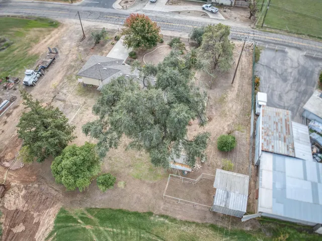 a view of a yard with an outdoor space