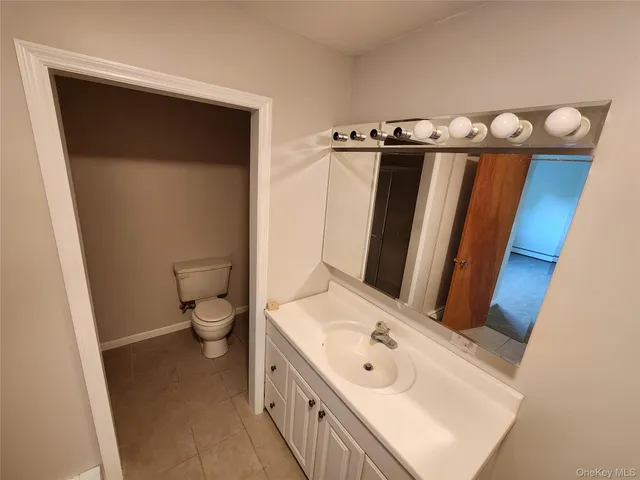 a view of car parked on street with trees