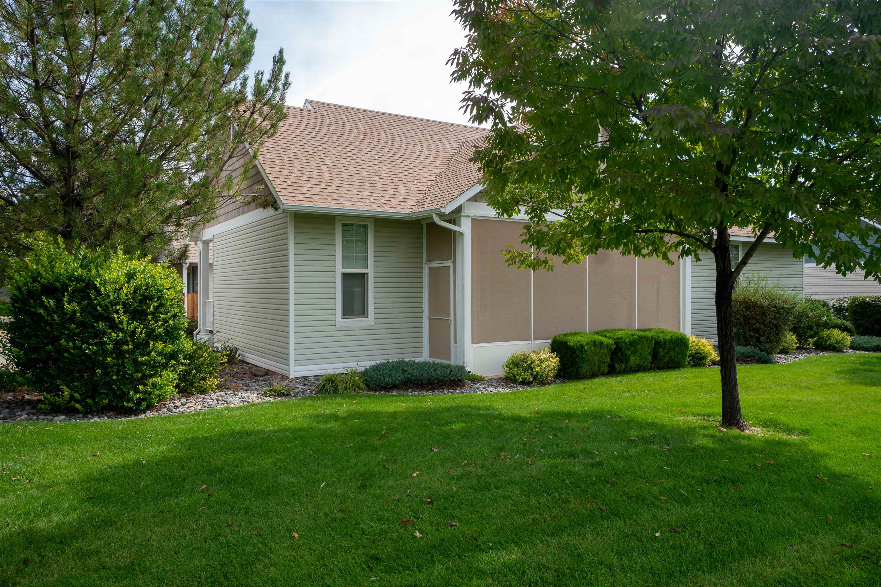 1111 Daisy Lane, Unit 32 Fruita, CO 81521 - Photo 23 of 23 a view of backyard of house with green space