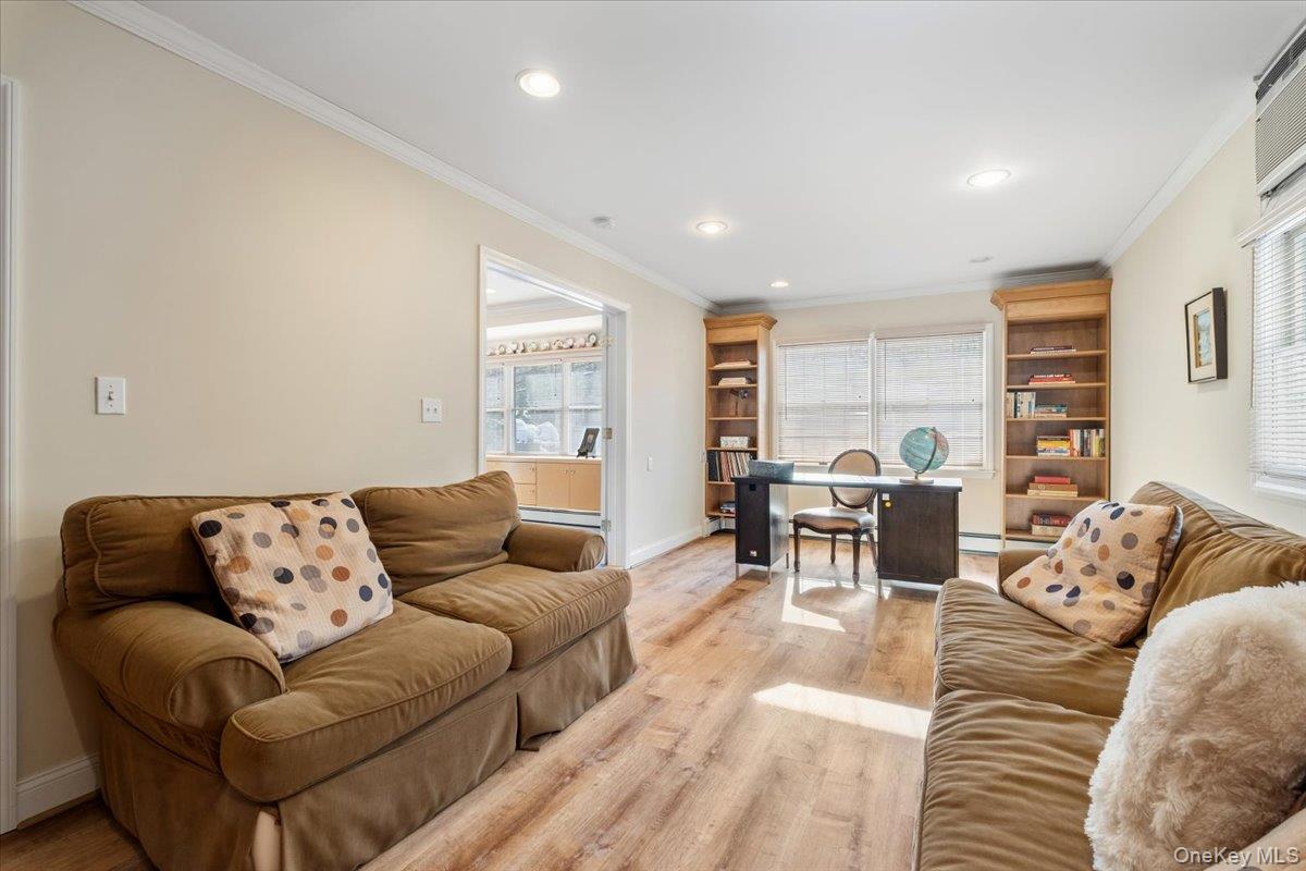 496 Granite Springs Road Yorktown Heights, NY 10598 - Photo 14 of 43 a living room with furniture and a large window