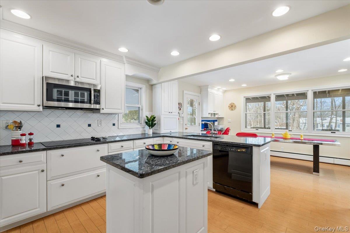 496 Granite Springs Road Yorktown Heights, NY 10598 - Photo 19 of 43 a kitchen that has a sink and a stove in it