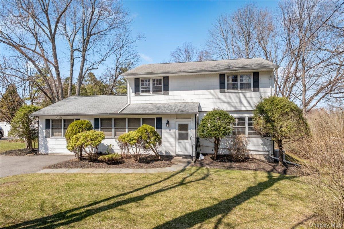 496 Granite Springs Road Yorktown Heights, NY 10598 - Photo 2 of 43 a front view of a house with garden