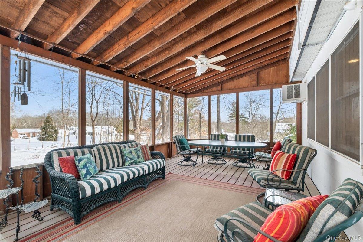 496 Granite Springs Road Yorktown Heights, NY 10598 - Photo 32 of 43 a living room with furniture and a large window
