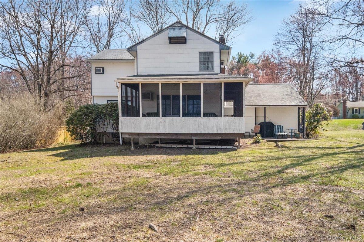 496 Granite Springs Road Yorktown Heights, NY 10598 - Photo 37 of 43 a front view of a house with a yard