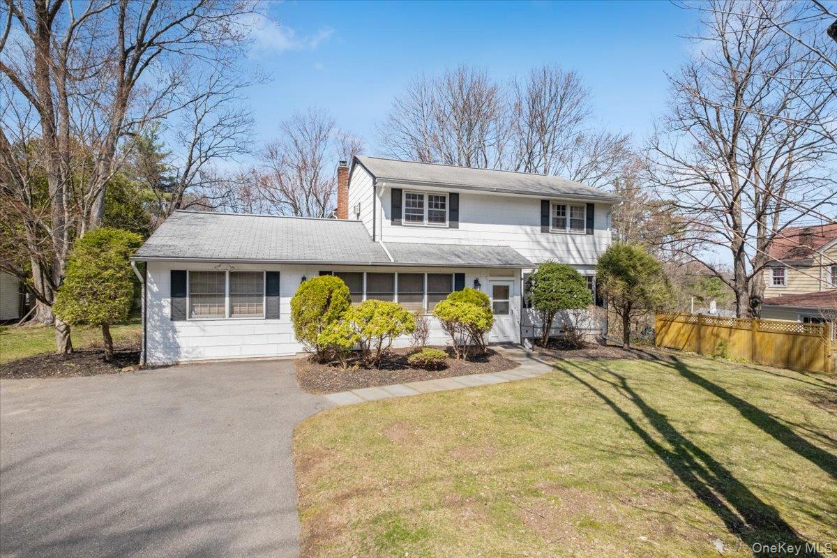 496 Granite Springs Road Yorktown Heights, NY 10598 - Photo 4 of 43 a front view of a house with garden