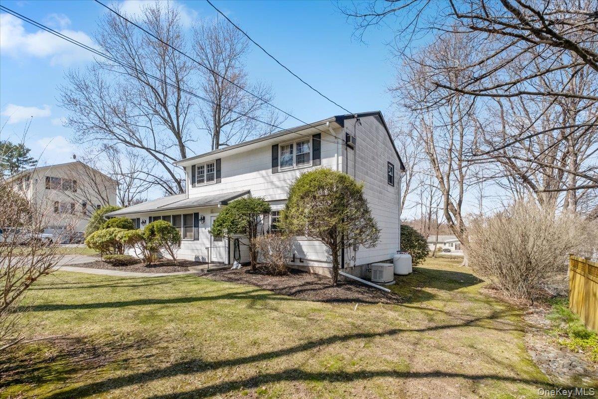 496 Granite Springs Road Yorktown Heights, NY 10598 - Photo 6 of 43 a view of a house with a yard