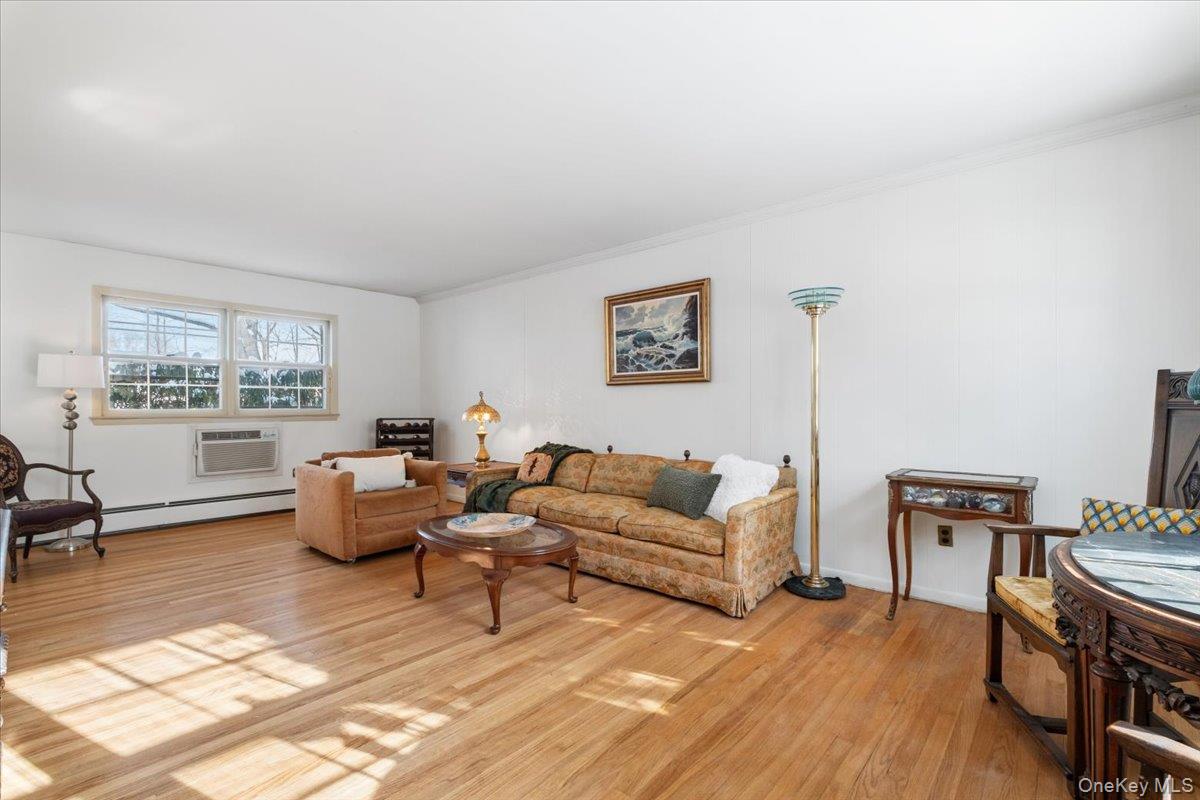 496 Granite Springs Road Yorktown Heights, NY 10598 - Photo 9 of 43 a living room with furniture and a window