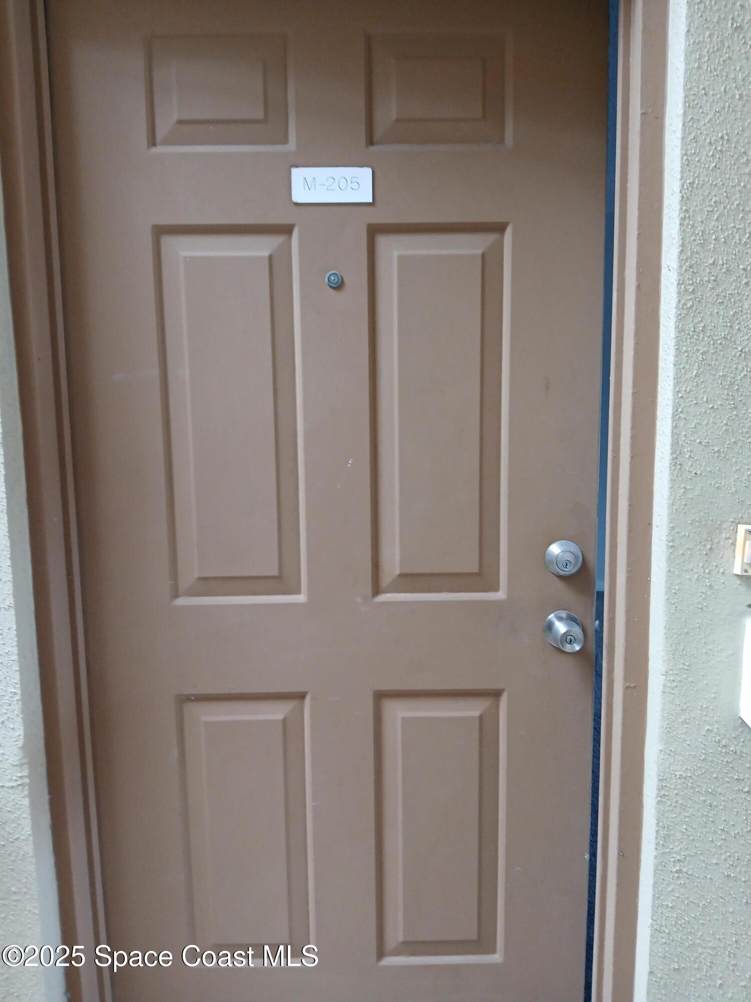 1648 Sunny Brook Lane, Unit M205 Palm Bay, FL 32905 - Photo 2 of 11 CGII M205 1.17.25