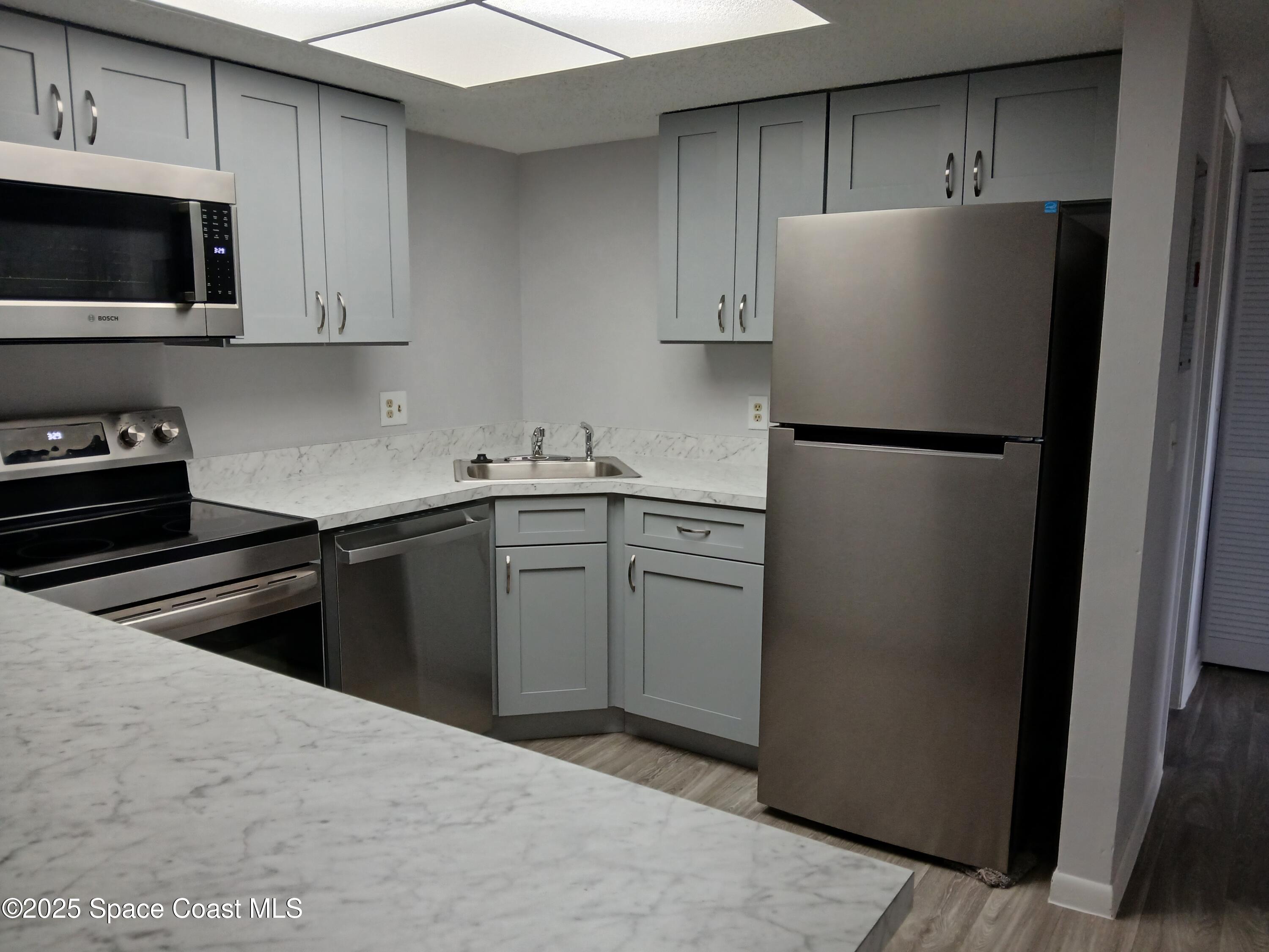 1648 Sunny Brook Lane, Unit M205 Palm Bay, FL 32905 - Photo 4 of 11 Kit view 1