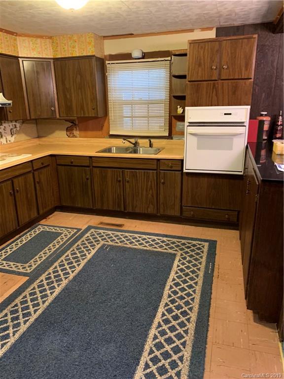 4950 Woodleaf Road Salisbury, NC 28147 - Photo 8 of 10 a view of a kitchen with wooden floor