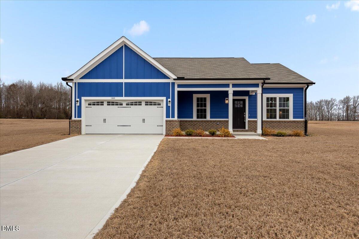 1300 Nick Coley Road Whitakers, NC 27891 - Photo 1 of 47 a front view of a house with a yard