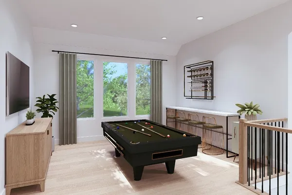 a room with furniture and a potted plant