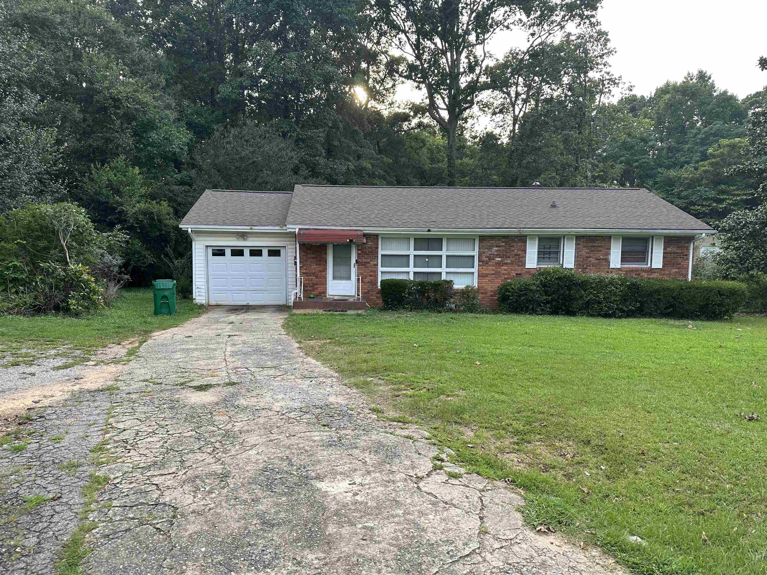 1467 Austin Drive Decatur, GA 30032 - Photo 1 of 1 a house view with a garden space
